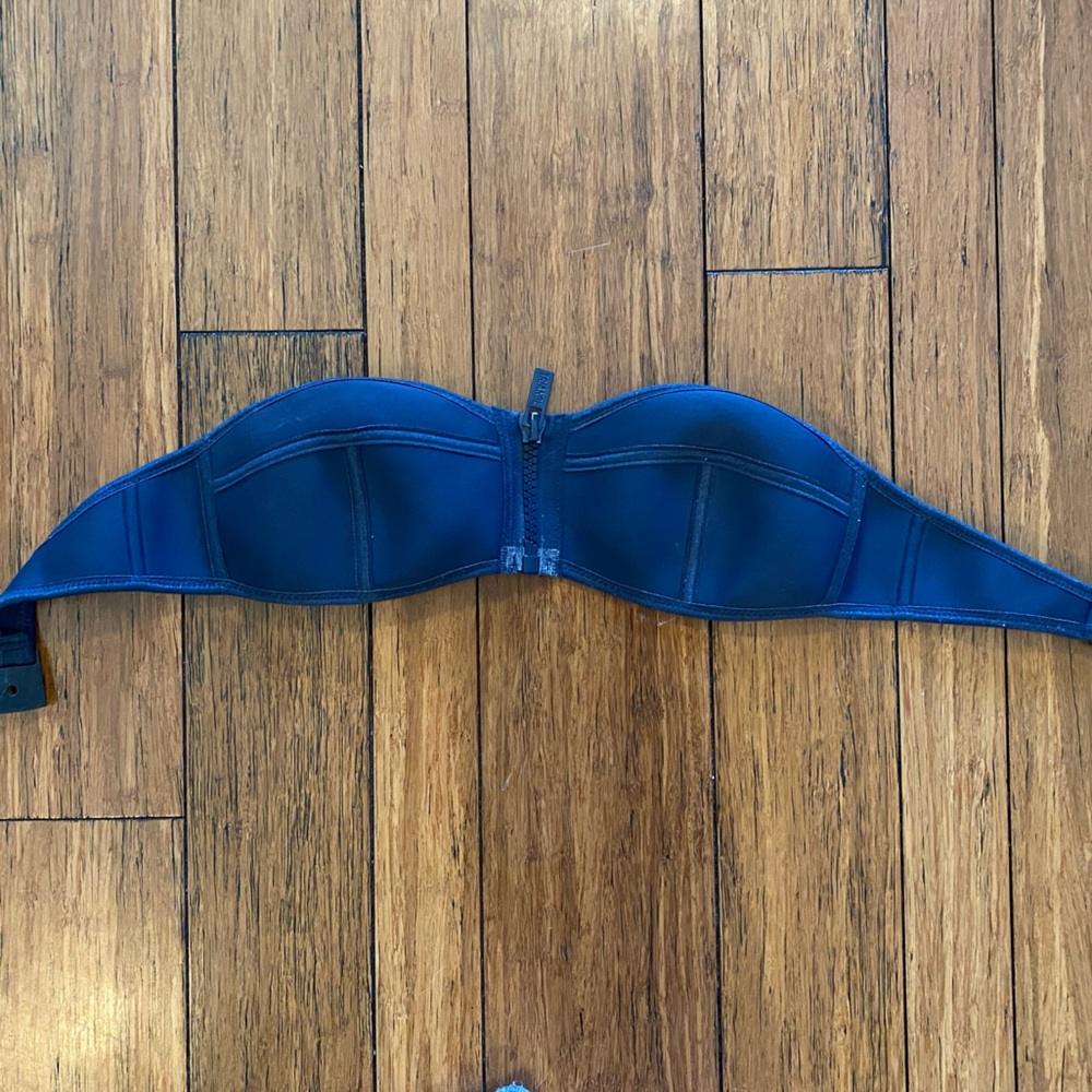 Triangl clasped top.